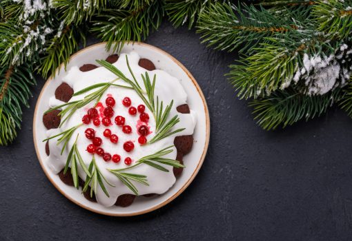 Festive Christmas cake decorated with seasonal designs Festive Christmas cake decorated with seasonal designs