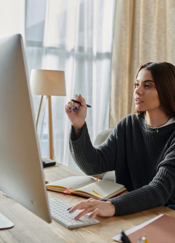 Focused content creation: a young woman works remotely