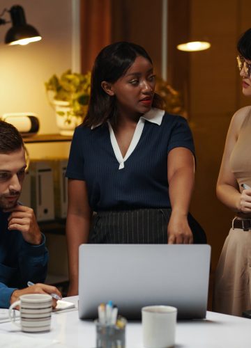 Group of business people working on pitch deck