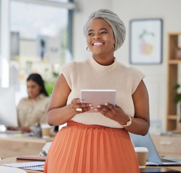 Tablet, work and happy smile of a Muslim black woman in a digital marketing office. International, Tablet, work and happy smile of a Muslim black woman in a digital marketing office. International,